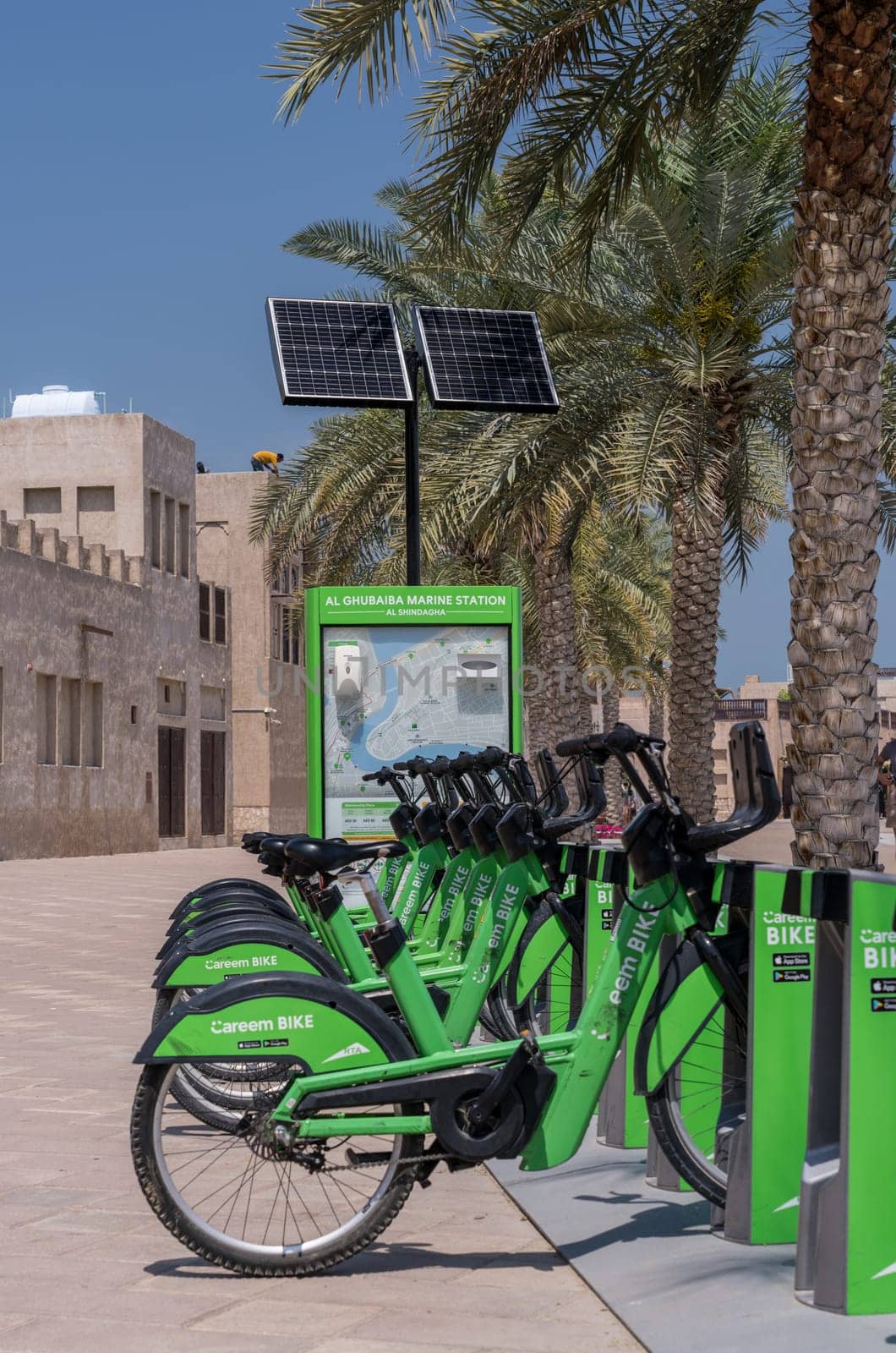 Dubai, UAE - 31 March 2023: Careem bike rental stand in Al Shindagha district and museum in Bur Dubai