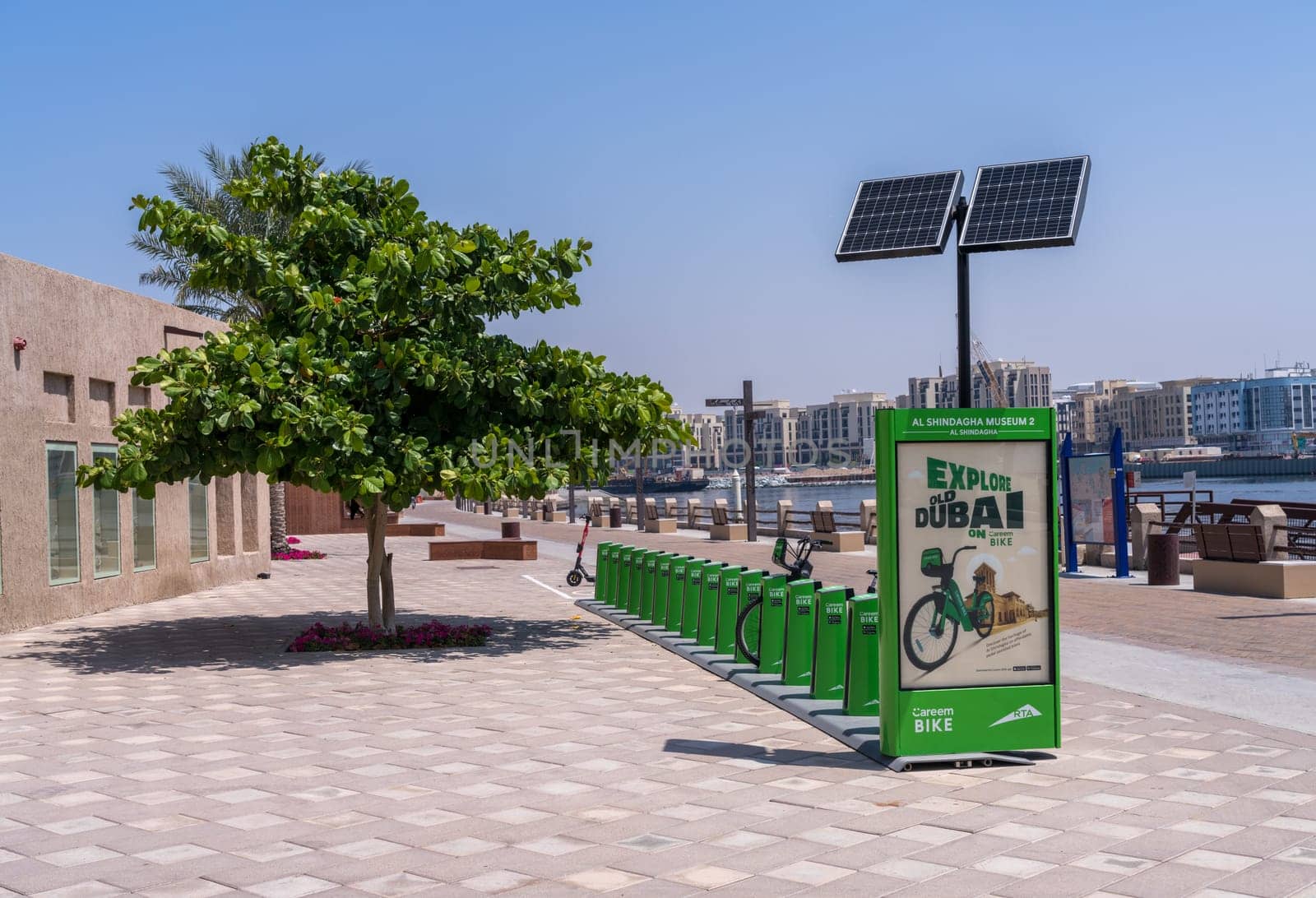 Dubai, UAE - 31 March 2023: Careem bike rental stand in Al Shindagha district and museum in Bur Dubai