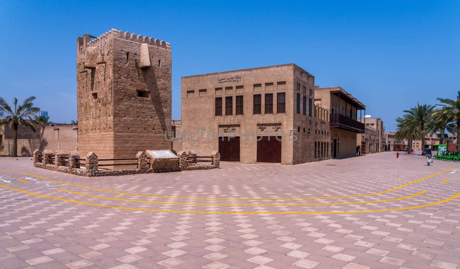 Dubai, UAE - 31 March 2023: Wide courtyard at entrance to Al Shindagha district and museum in Bur Dubai