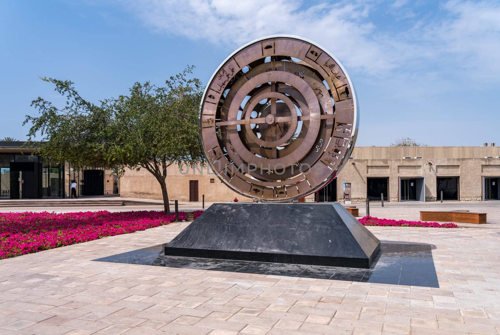 Dubai, UAE - 31 March 2023: Sculpture by Mattar bin Lahej outside the Al Shindagha district and museum in Bur Dubai