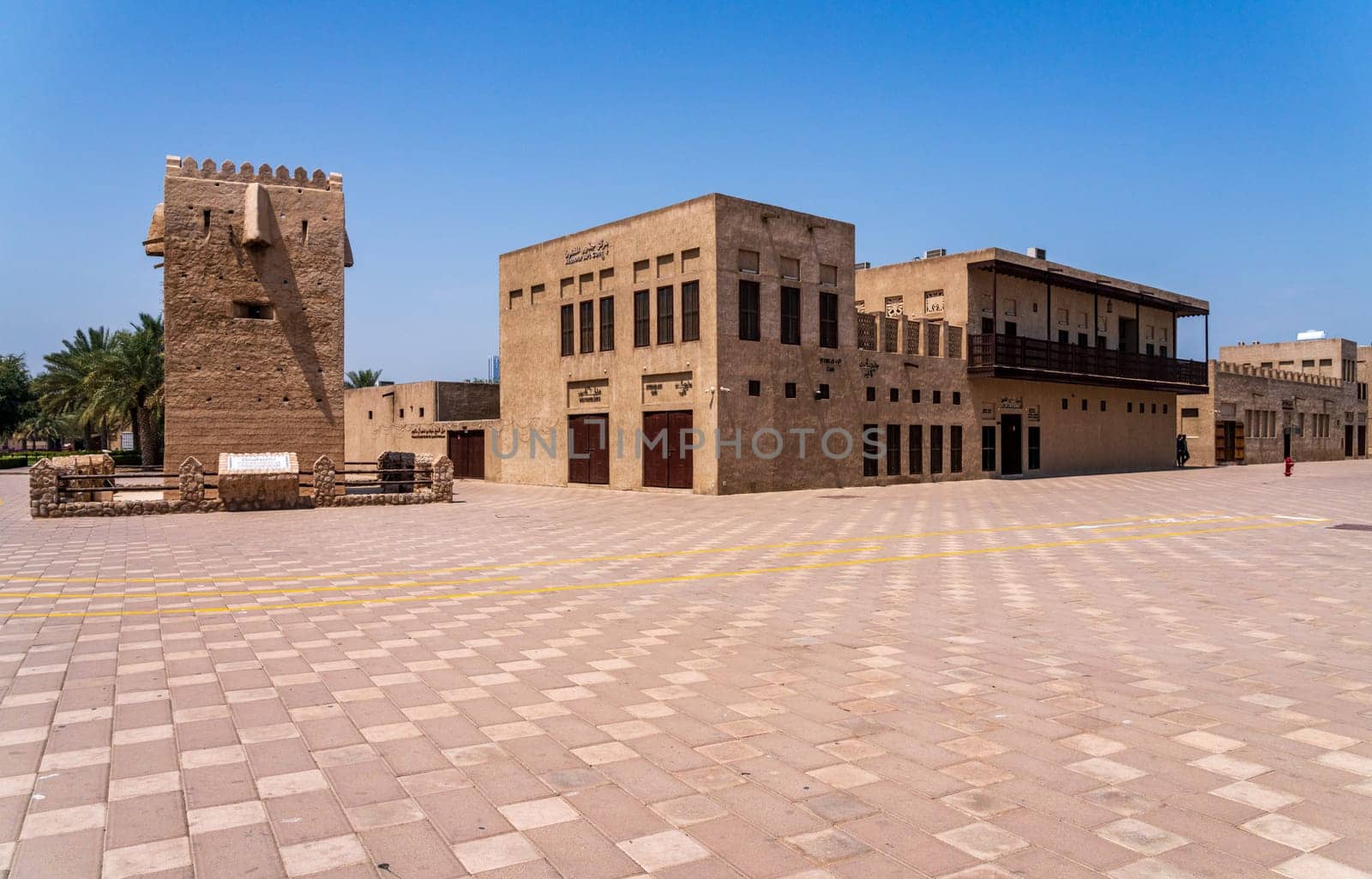 Dubai, UAE - 31 March 2023: Wide courtyard at entrance to Al Shindagha district and museum in Bur Dubai