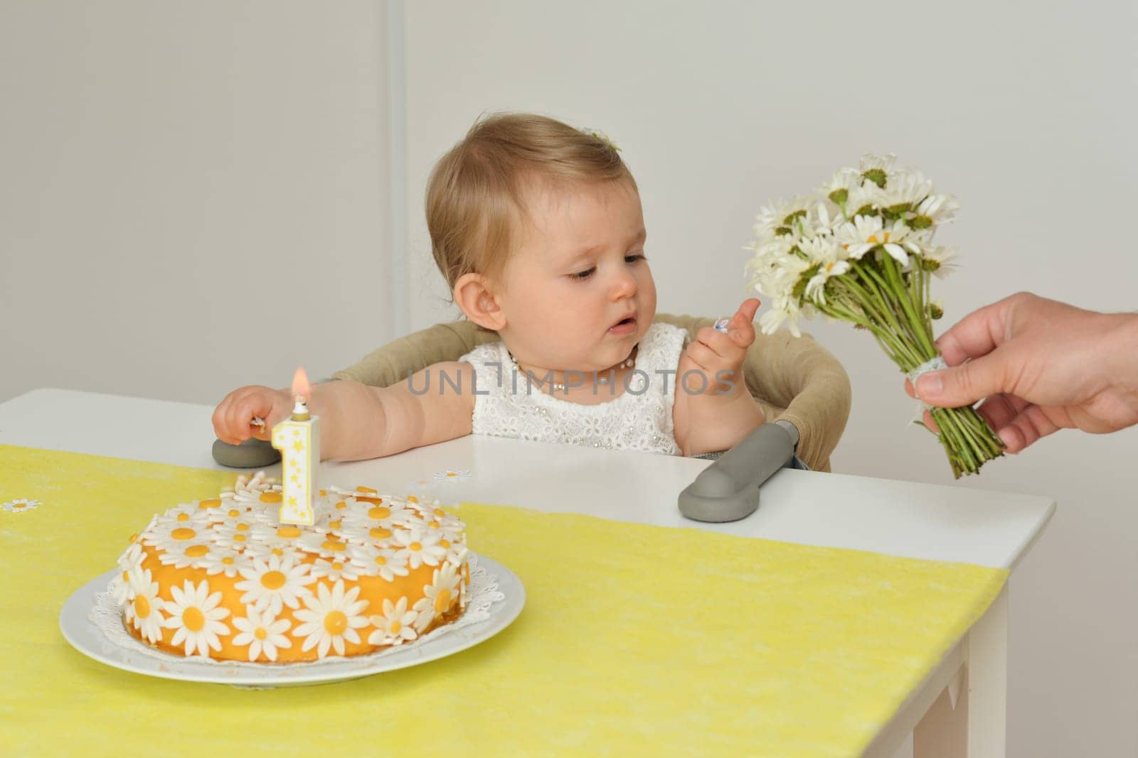 Yellow cake with daisy flowers chamomile for birthday