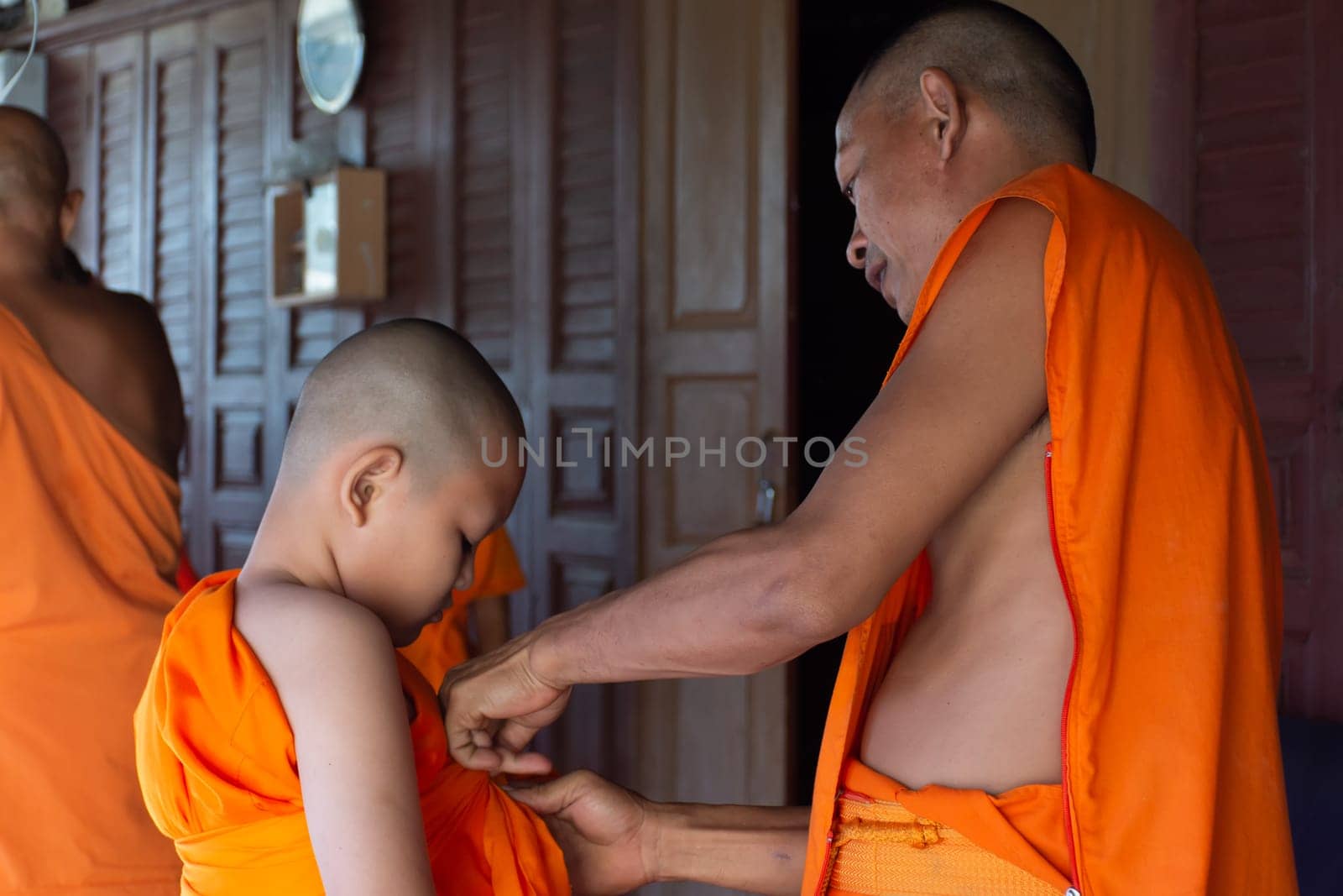 Ang Thong, Thailand - October 23, 2016 : Unidentified asian boy in ordination ceremony in buddhist for ordain become a novice monk or little neophyte in ordination ceremony in buddhist in Thailand