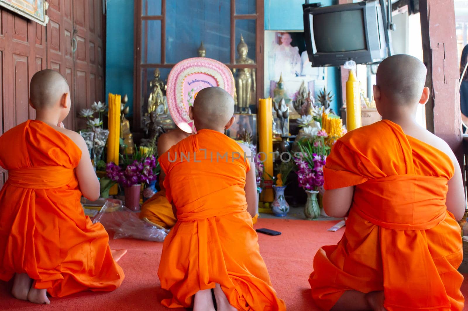 Ang Thong, Thailand - October 23, 2016 : Unidentified asian boy in ordination ceremony in buddhist for ordain become a novice monk or little neophyte in ordination ceremony in buddhist in Thailand