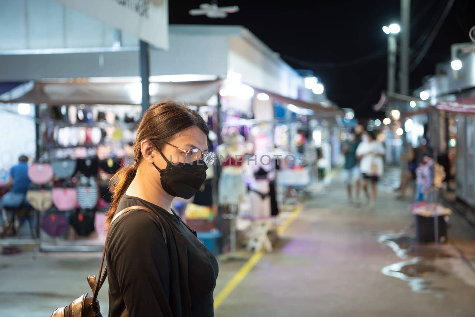 Woman (LGBTQ) posing with food at thai street food by NongEngEng