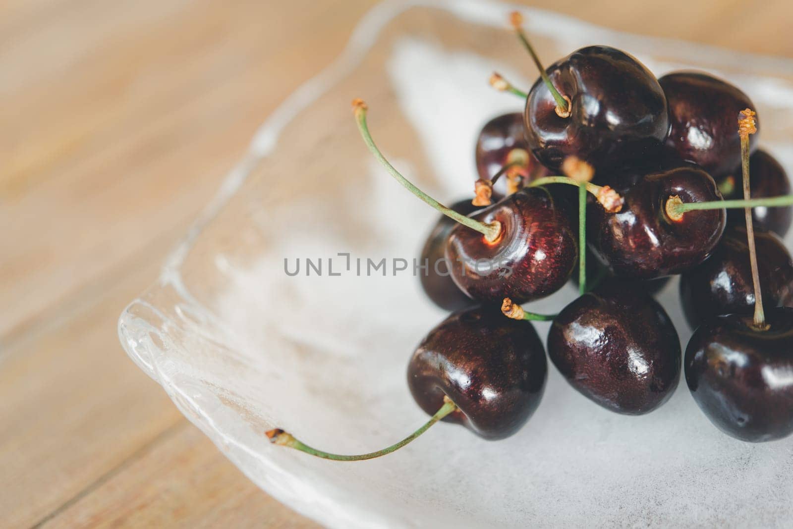 Cherry fresh berry fruit sweet juicy on wood table by PongMoji