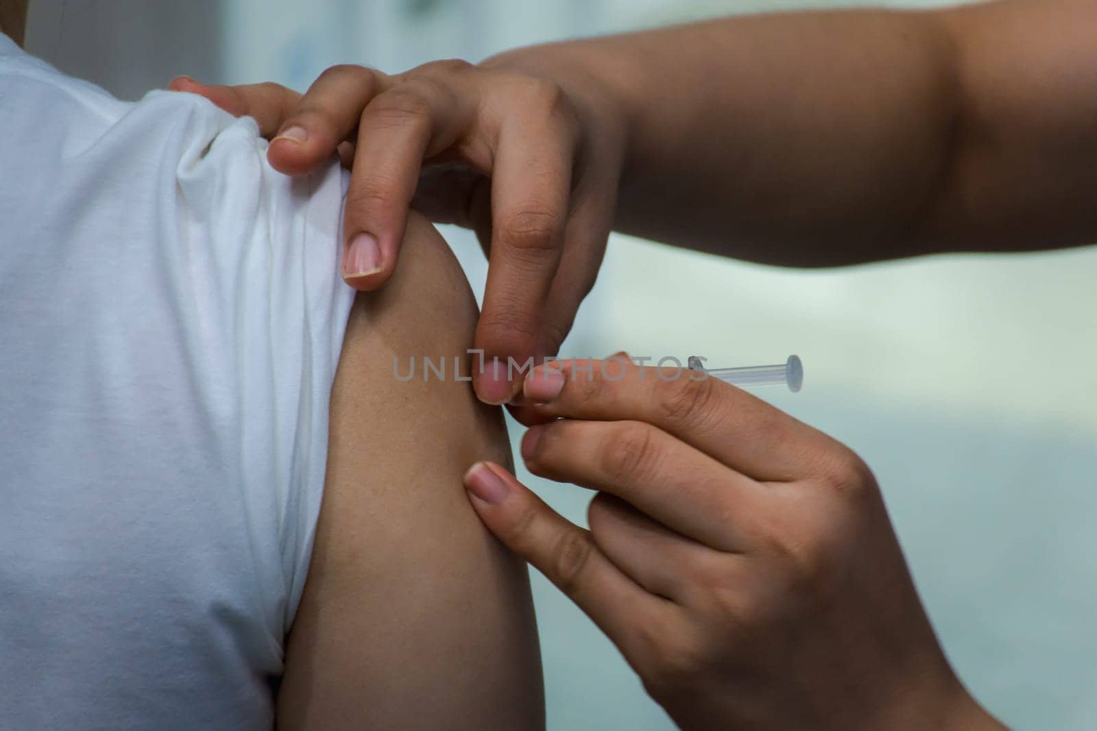 Patient asian woman health check by get vaccinated against the flu covid19 or corona virus every year by the Ministry of Health at hospital in concept illness, outbreak, healthcare in life