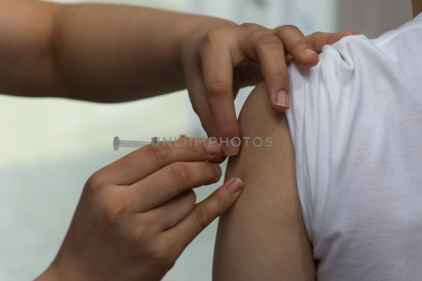 Patient asian woman get vaccinated the flu covid19 by PongMoji