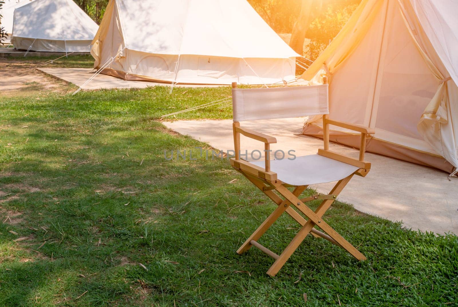 Camping picnic tent campground in outdoor hiking forest. Camper while campsite in nature background at summer trip camp. Adventure Travel Vacation concept