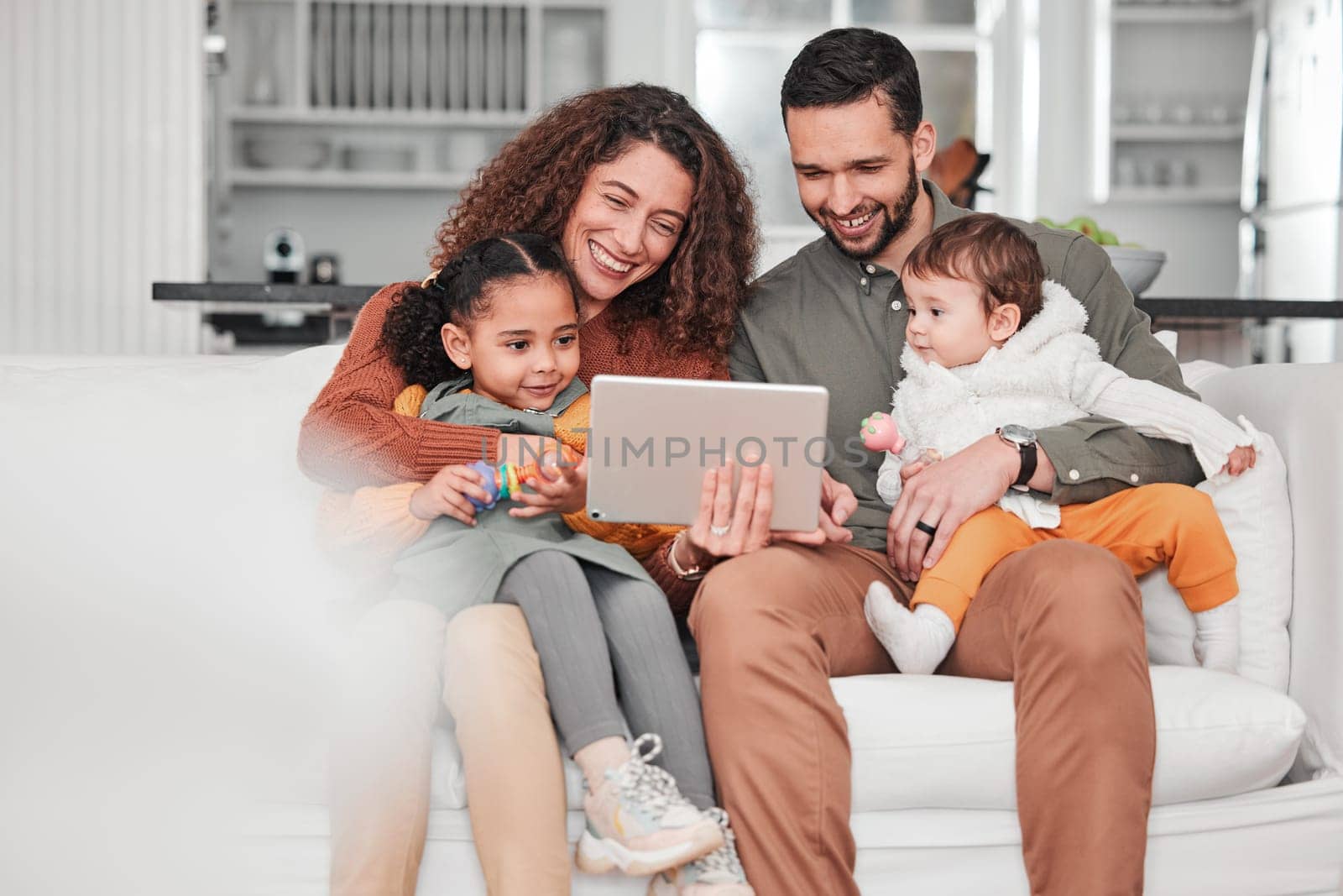 Happy family on couch with tablet, children and bonding, streaming service for child development video with mockup space. Mother, father and kids on sofa, happiness and smile in digital entertainment.