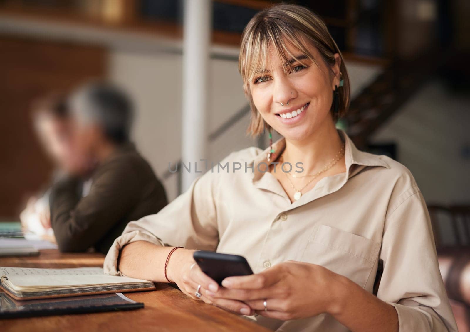 Portrait, business and woman with smartphone, typing and smile with connection, chatting and social media. Face, female or consultant with cellphone, mobile app or communication with device in office by YuriArcurs