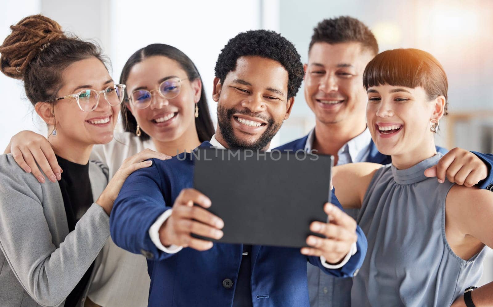 Selfie, office smile and business people in group staff or team building, tablet photography or online diversity post. Professional friends, career influencer or employees in teamwork profile picture by YuriArcurs