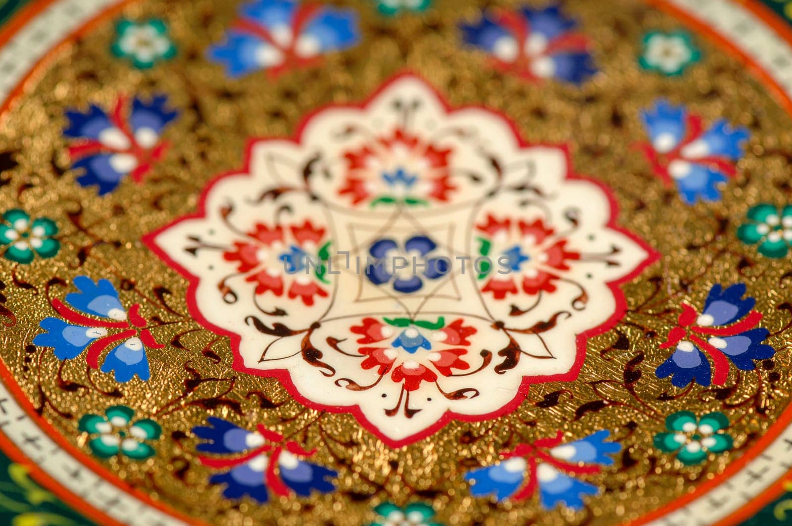 A closeup of a colorful artistic painting on a plate