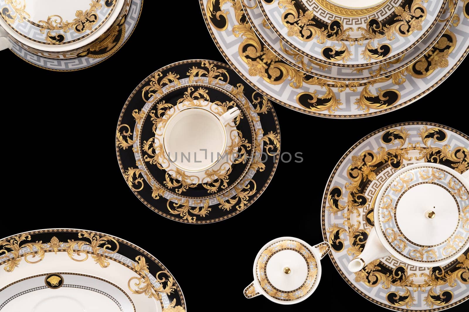 A luxury tableware set isolated on black background