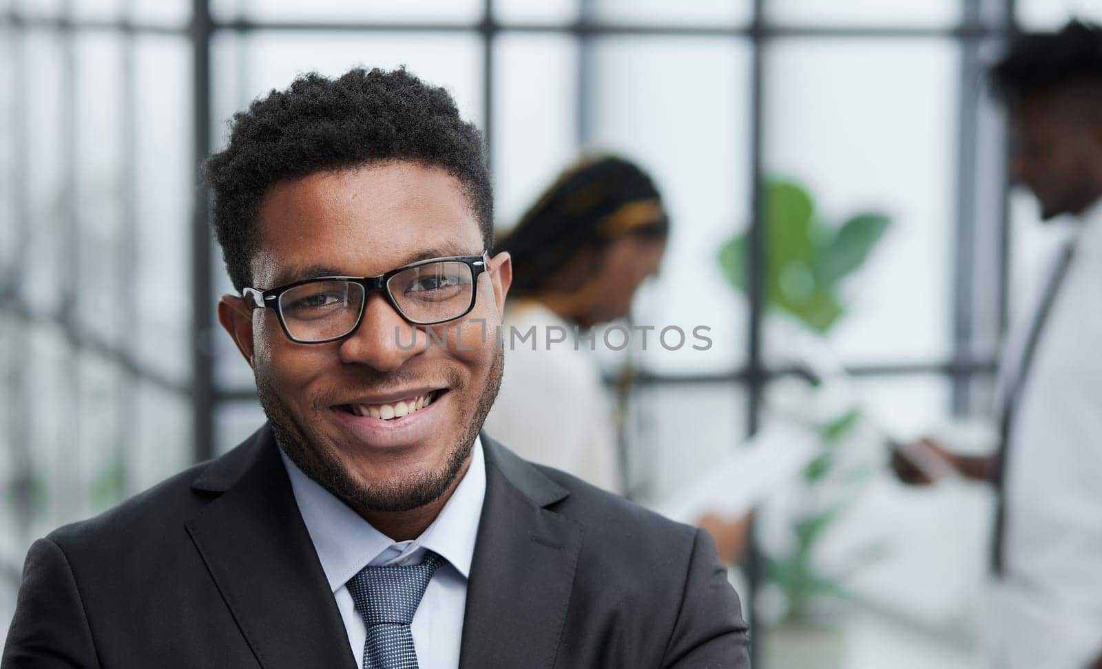 Handsome mature black male intellectual closeup portrait