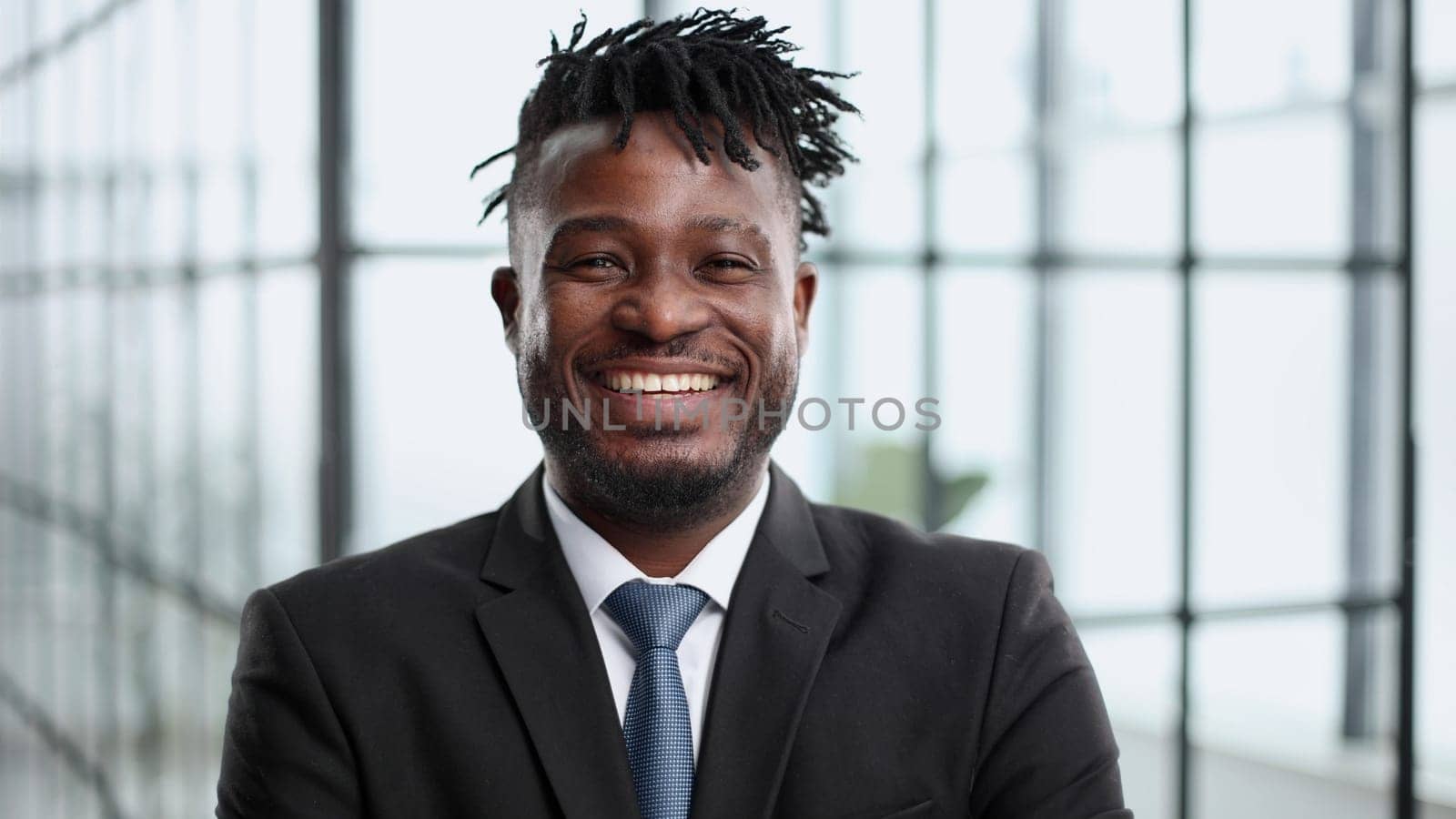 peaceful african american businessman in the office