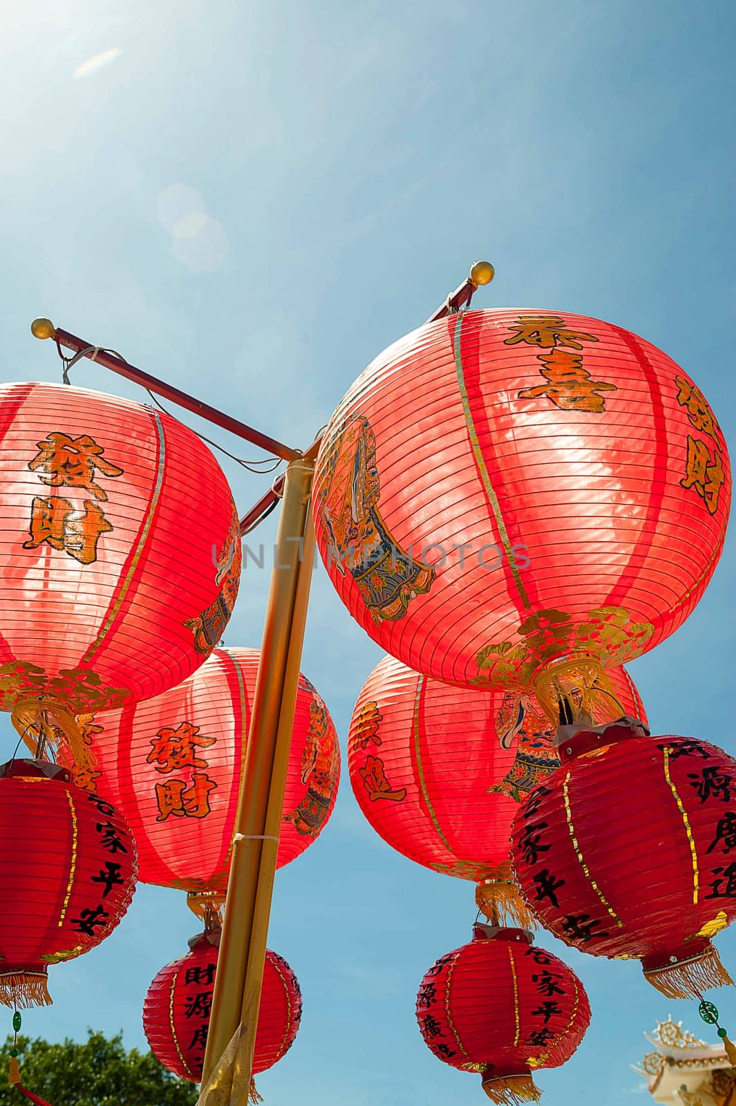 Paper lanterns at the Buddhist temple of Wat Mongkol Nimit, Phuket Town, Thailand