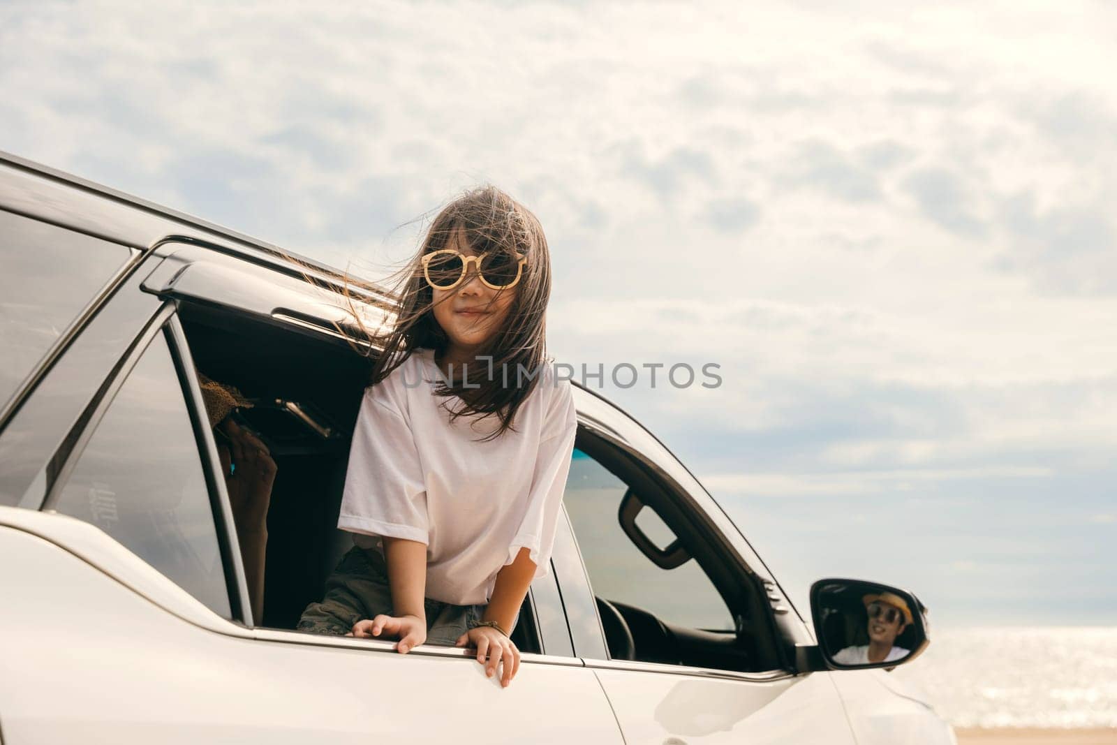 Father, mother and children girl smiling having fun sitting in compact white car look out window blue sky, Summer at beach, Car insurance, Family holiday vacation travel, car travel, Happy family day