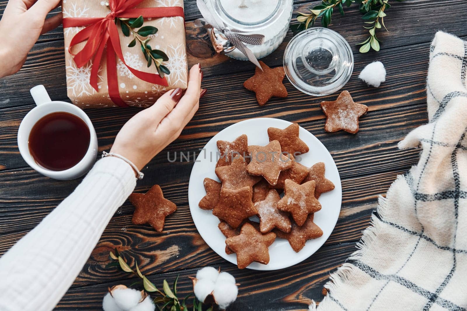 With woman hands. Christmas background with holiday decoration.