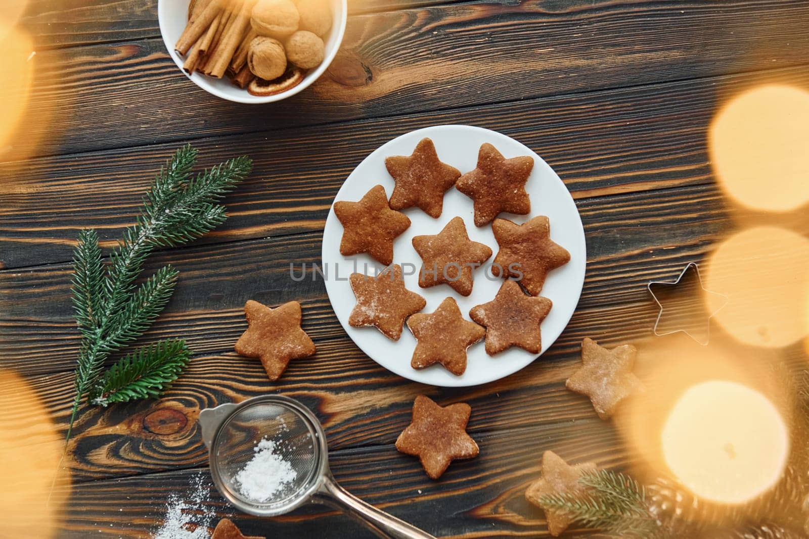 Cookies is on the plate. Christmas background with holiday decoration.