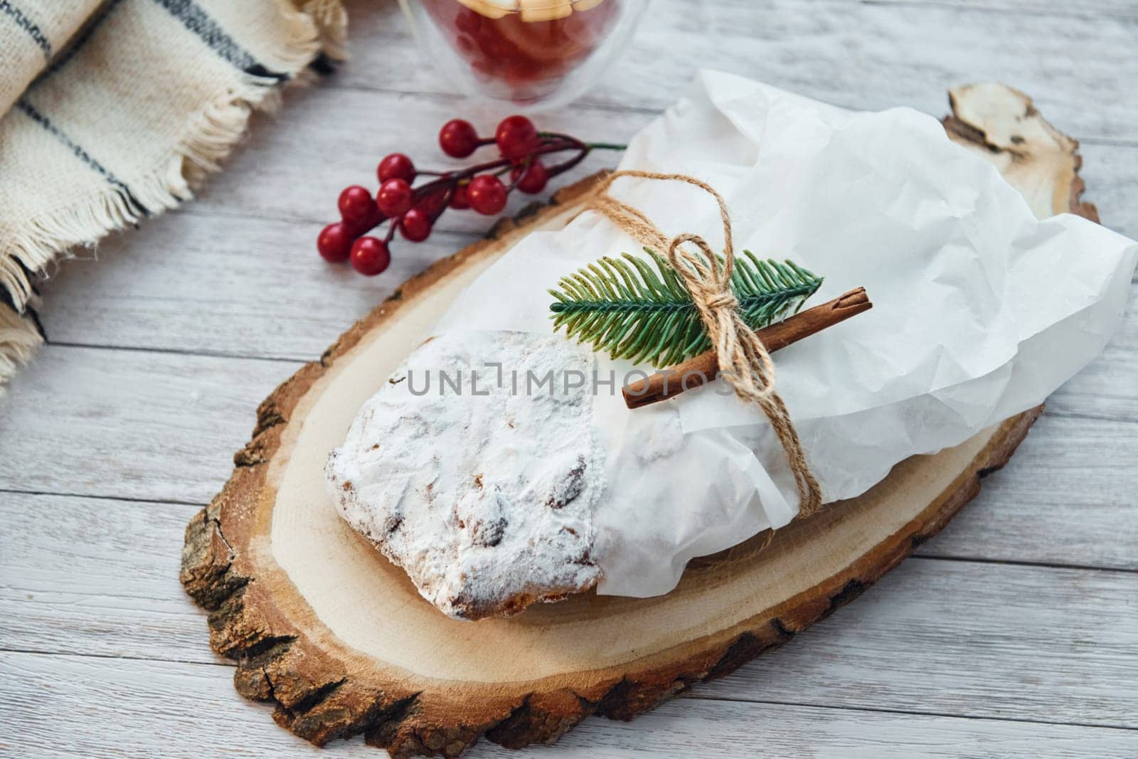 Close up view of stollen. Christmas background with holiday decoration by Standret