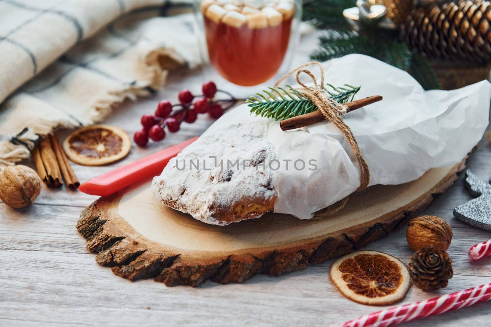 Close up view of stollen. Christmas background with holiday decoration by Standret