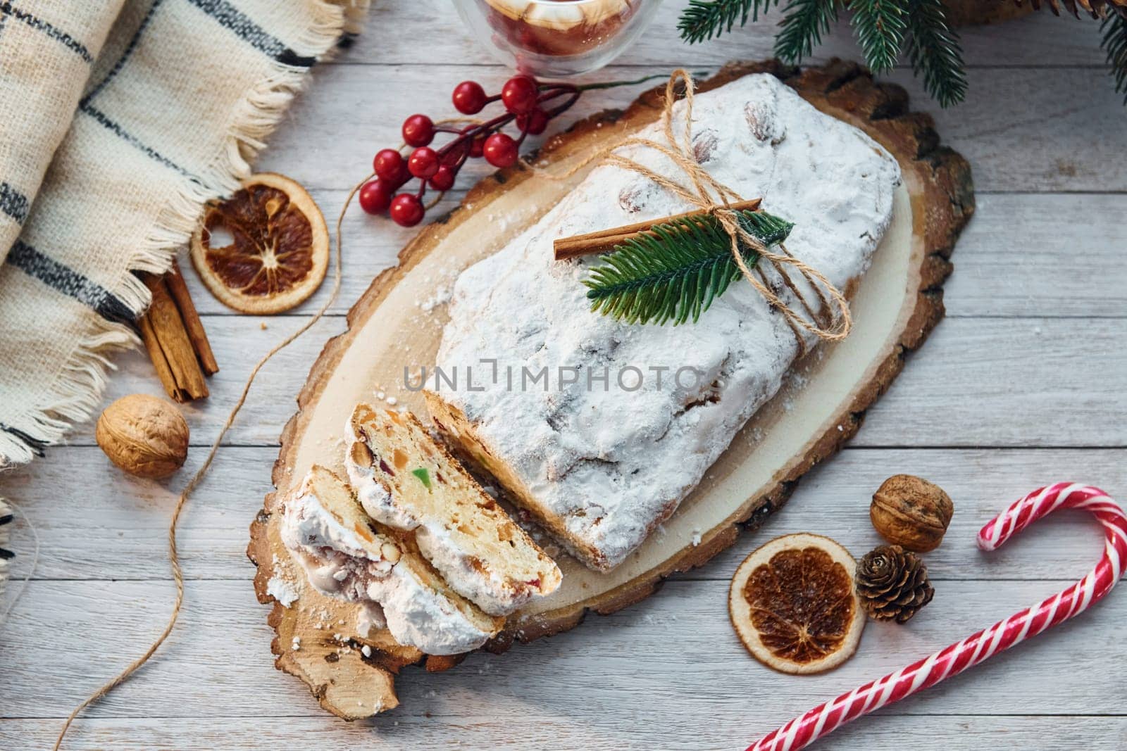 Close up view of stollen. Christmas background with holiday decoration.