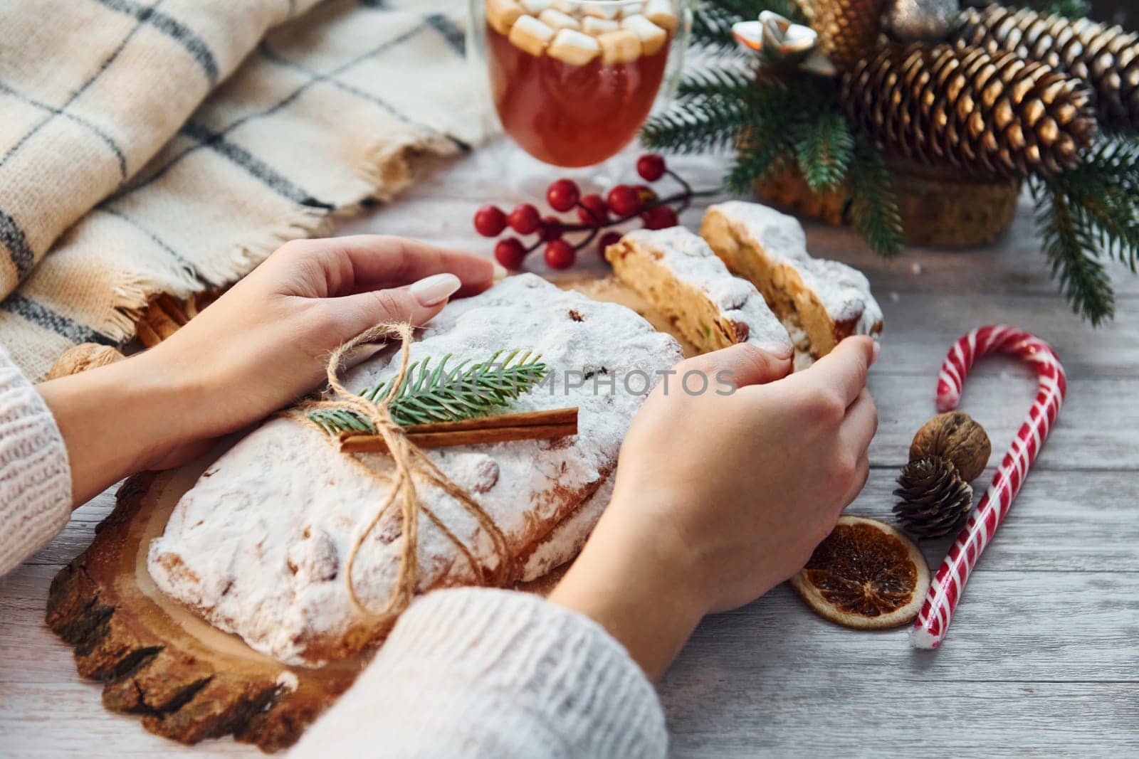 Stollen with holiday decorations. Christmas background.