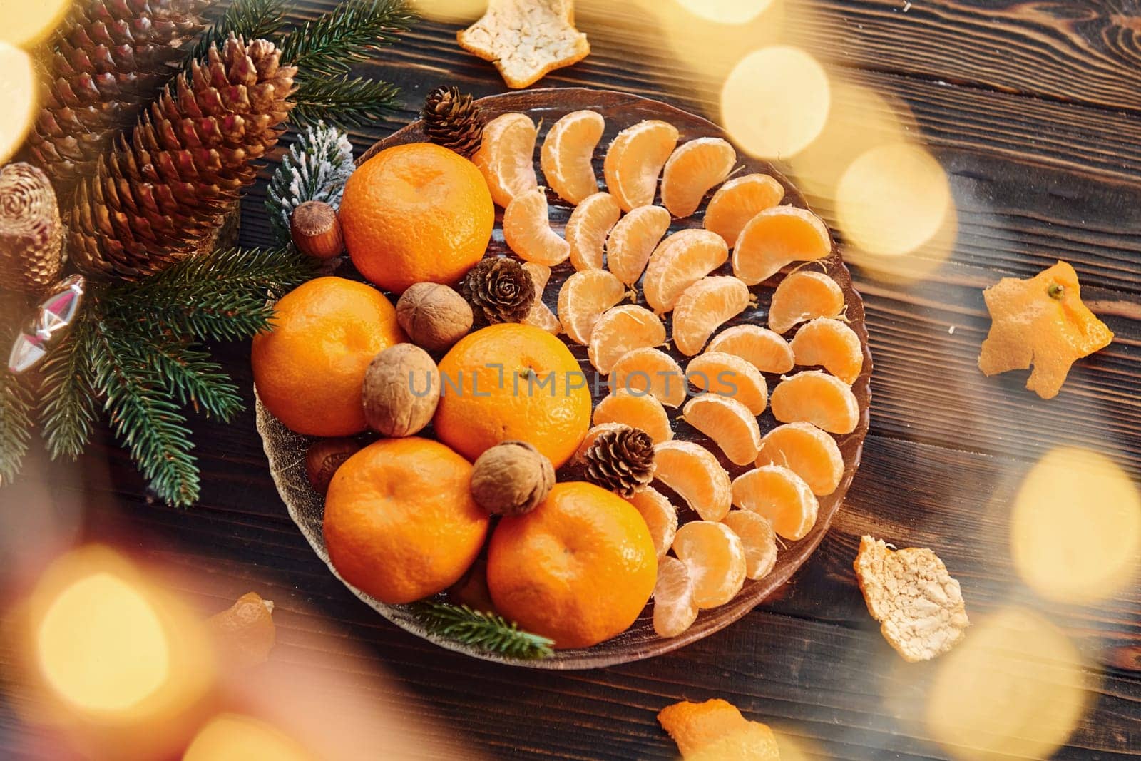 Fresh oranges. Christmas background with holiday decoration.
