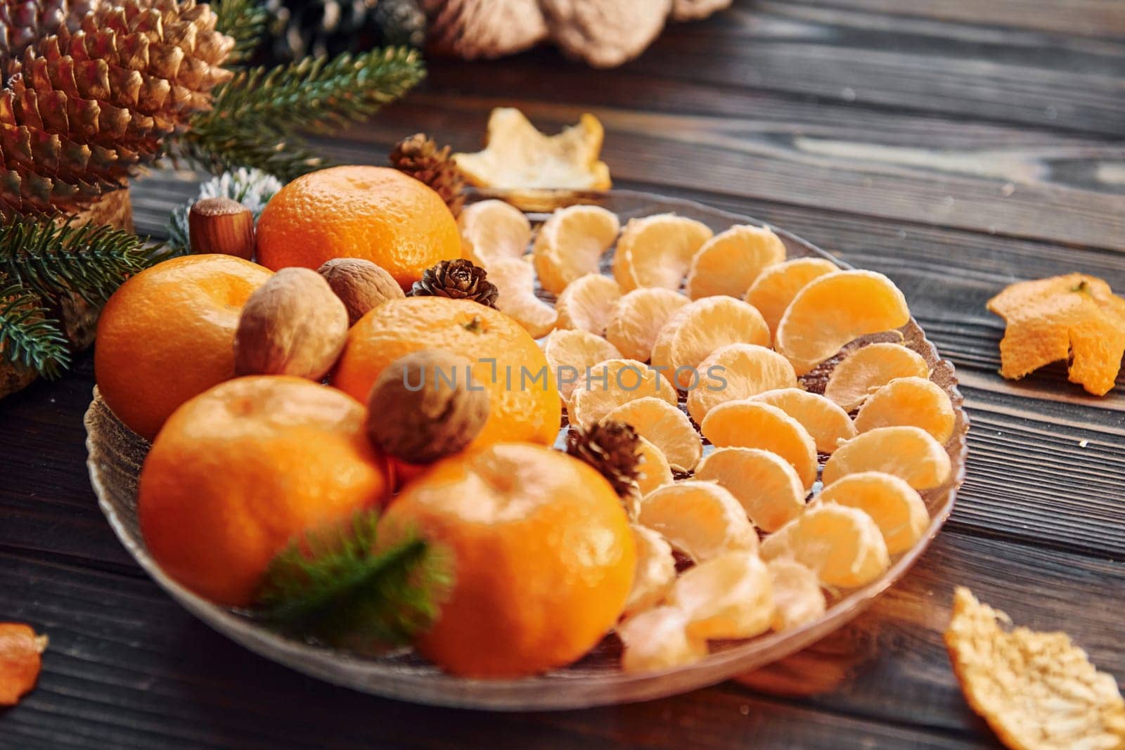 Fresh oranges. Christmas background with holiday decoration.