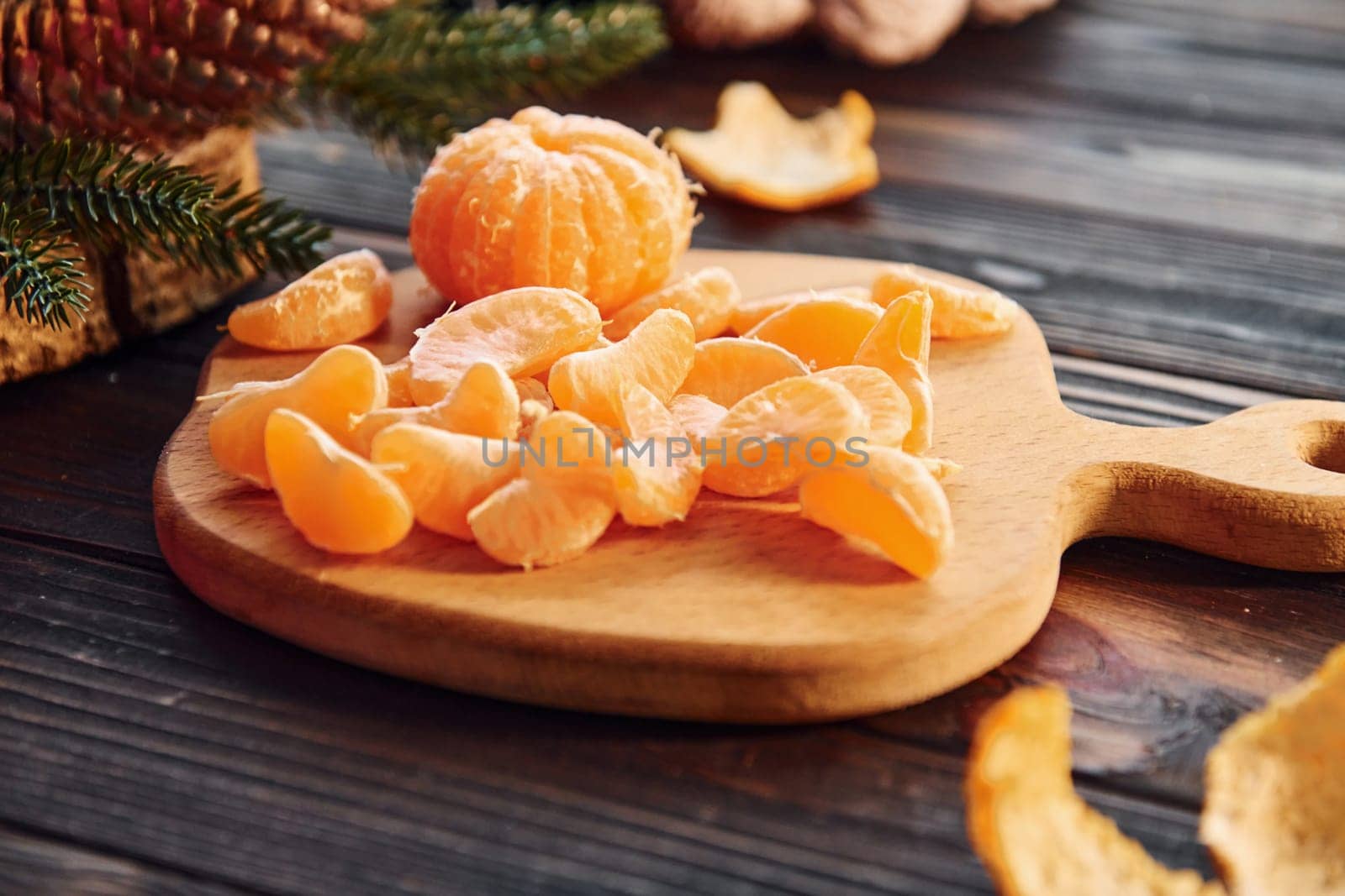 Fruits is on the table. Christmas background with holiday decoration by Standret