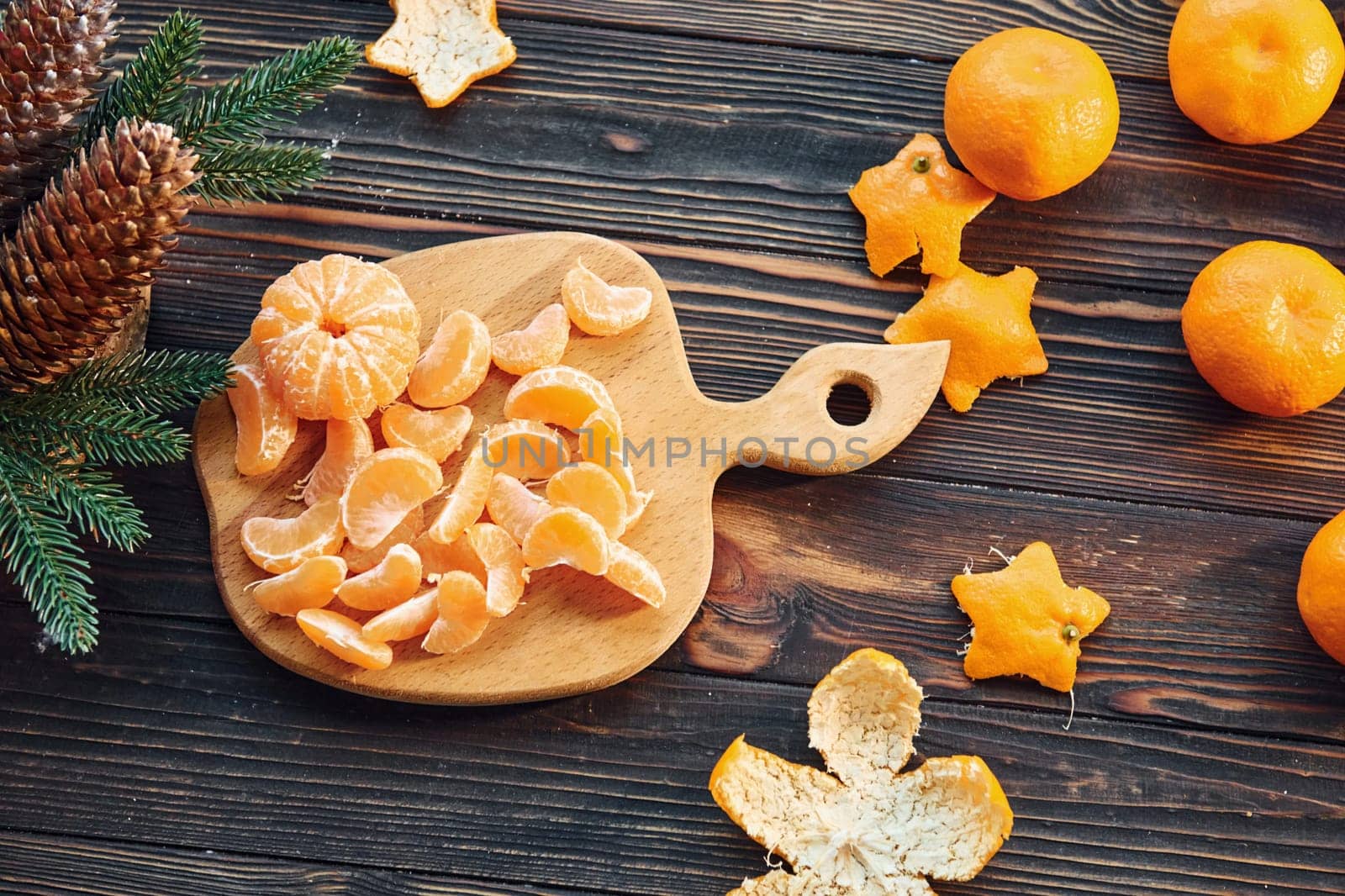 Fruits is on the table. Christmas background with holiday decoration.