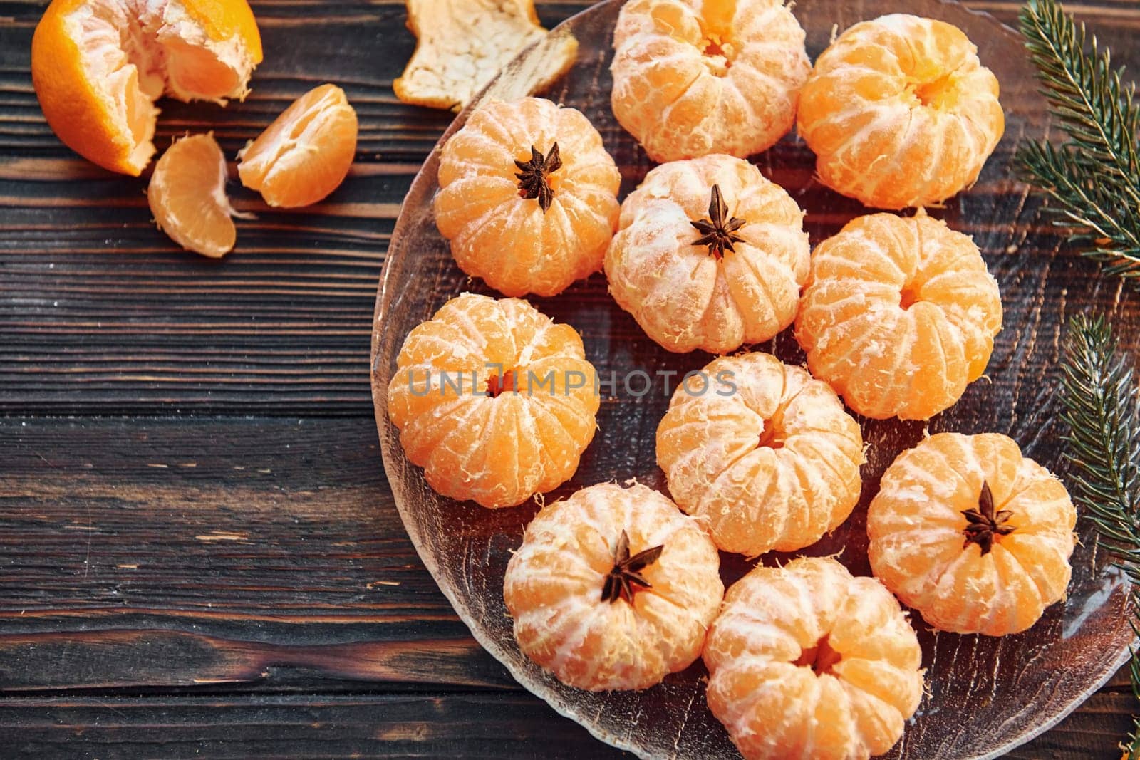 Fruits is on the table. Christmas background with holiday decoration by Standret