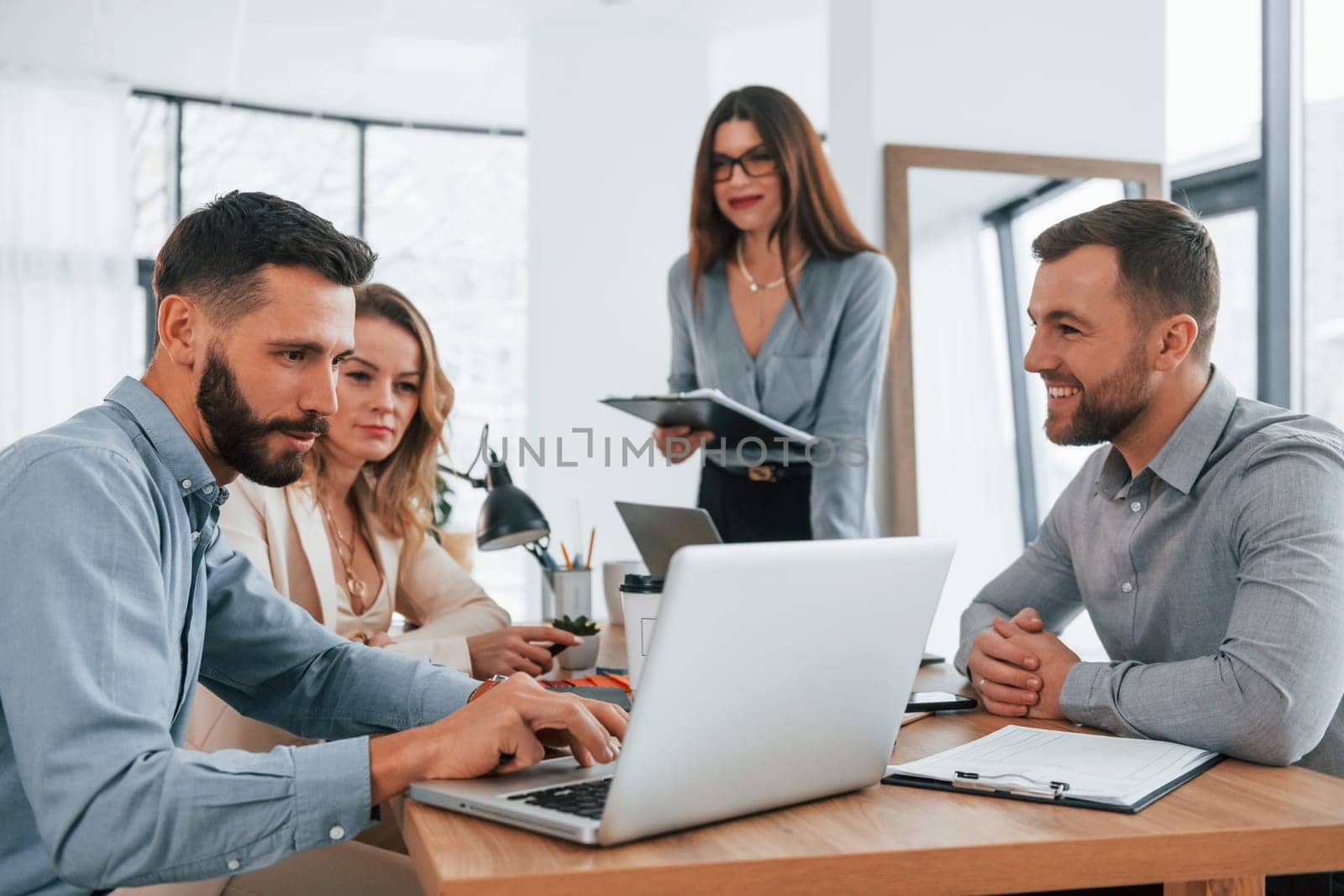 Successful team. Group of business people that working on the project in the office.