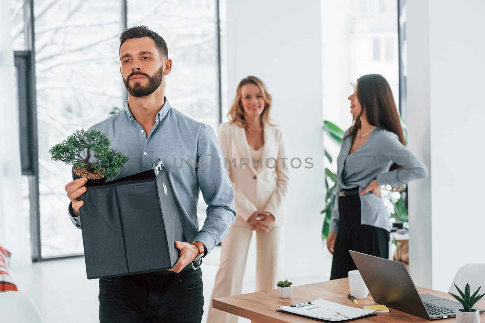 Winter daytime. Group of business people that working on the project in the office.