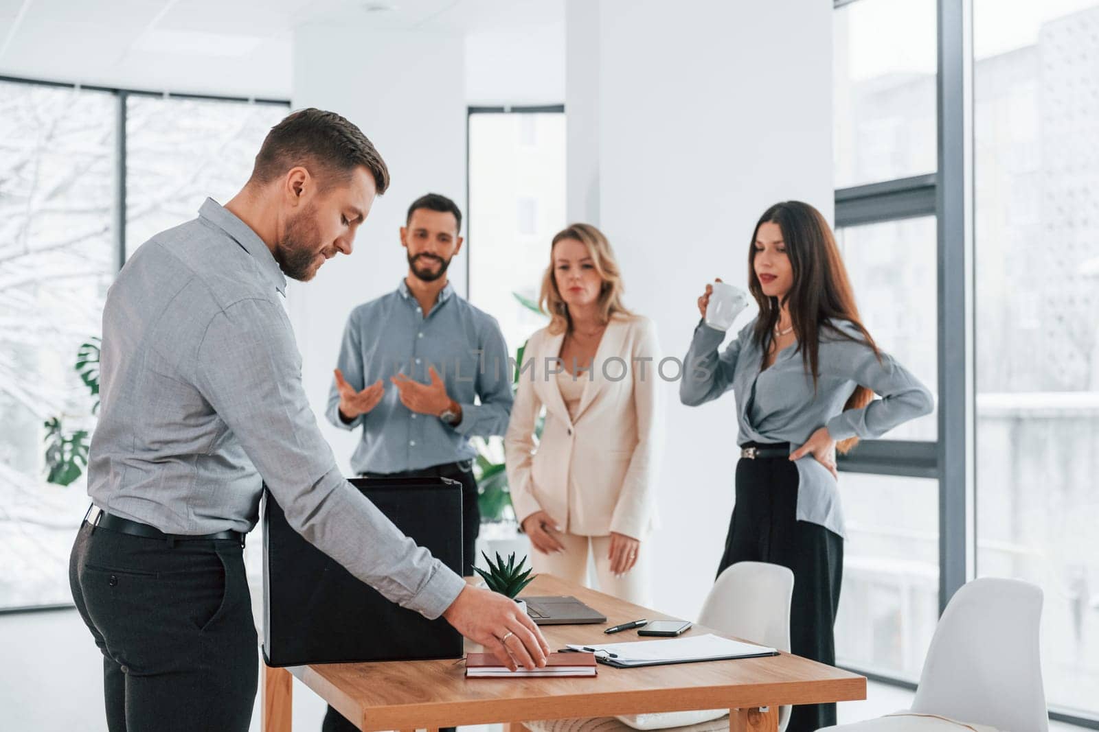 Professional occupation. Group of business people that working on the project in the office.
