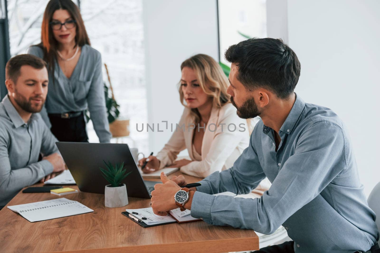 Smart employees. Group of business people that working on the project in the office.