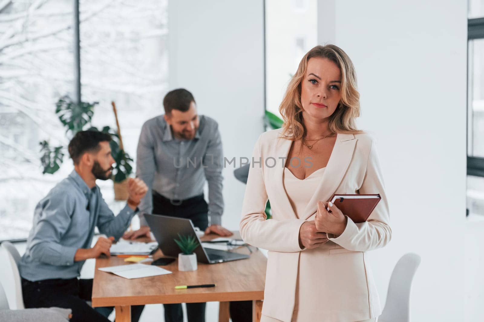 Sharing some ideas. Group of business people that working on the project in the office.