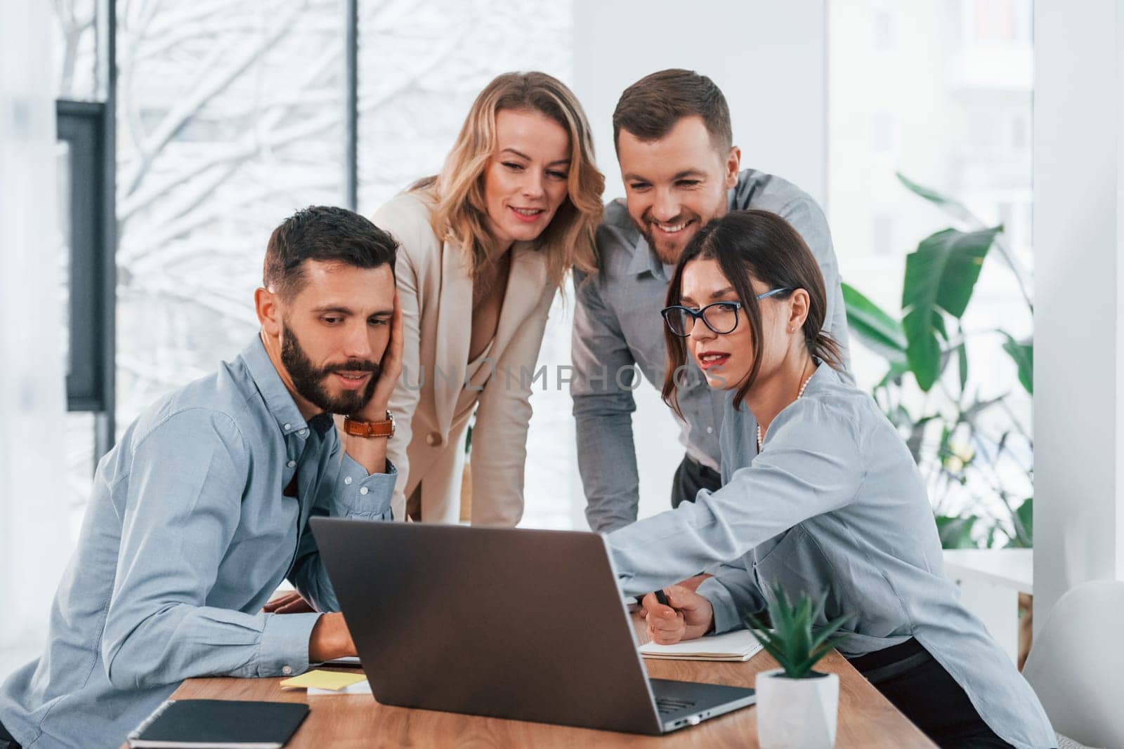 Internet connection by using laptop. Group of business people that working on the project in the office.