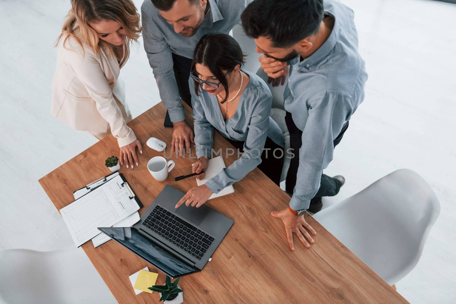Top view of business people that working by using laptop.