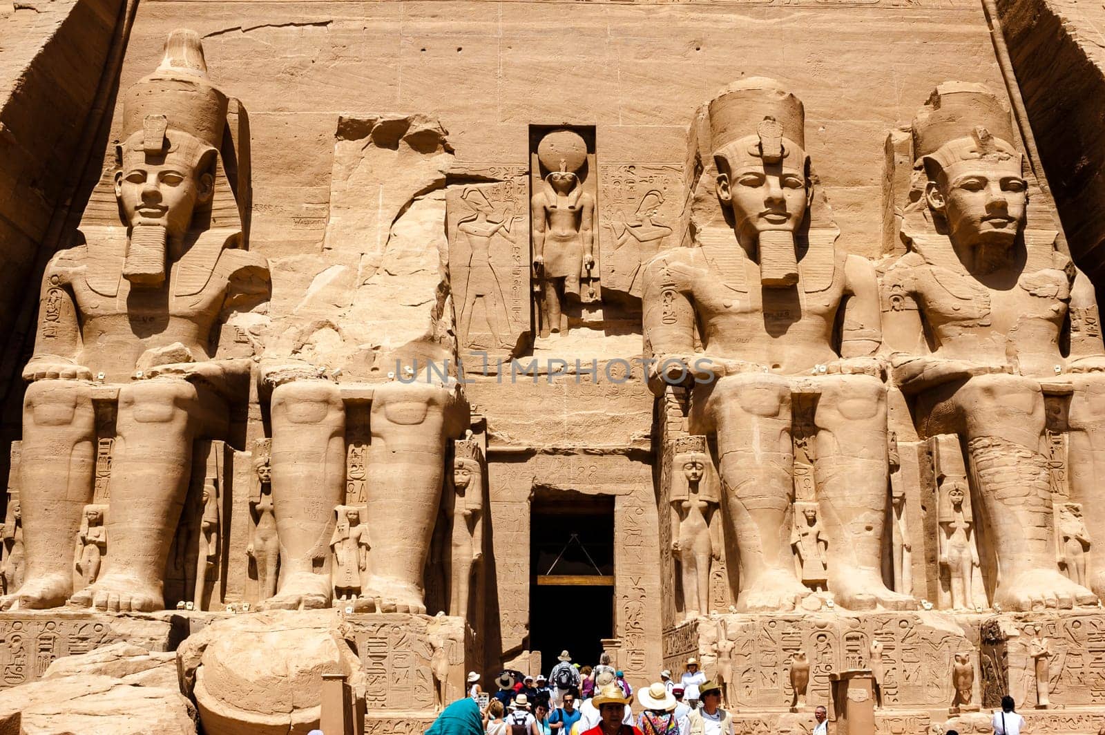 Abu Simbel, Aswan, Egypt - April 18 2008: Tourists visiting the archaeological site of Abu Simbel, Aswan, Egypt