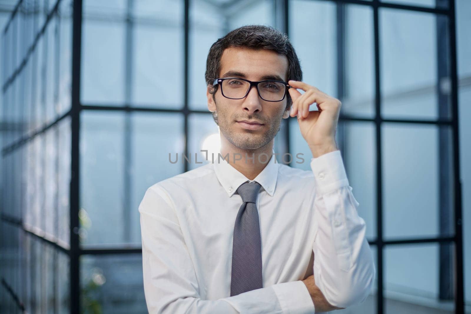 Portrait of handsome mature businessman wearing eyeglasses
