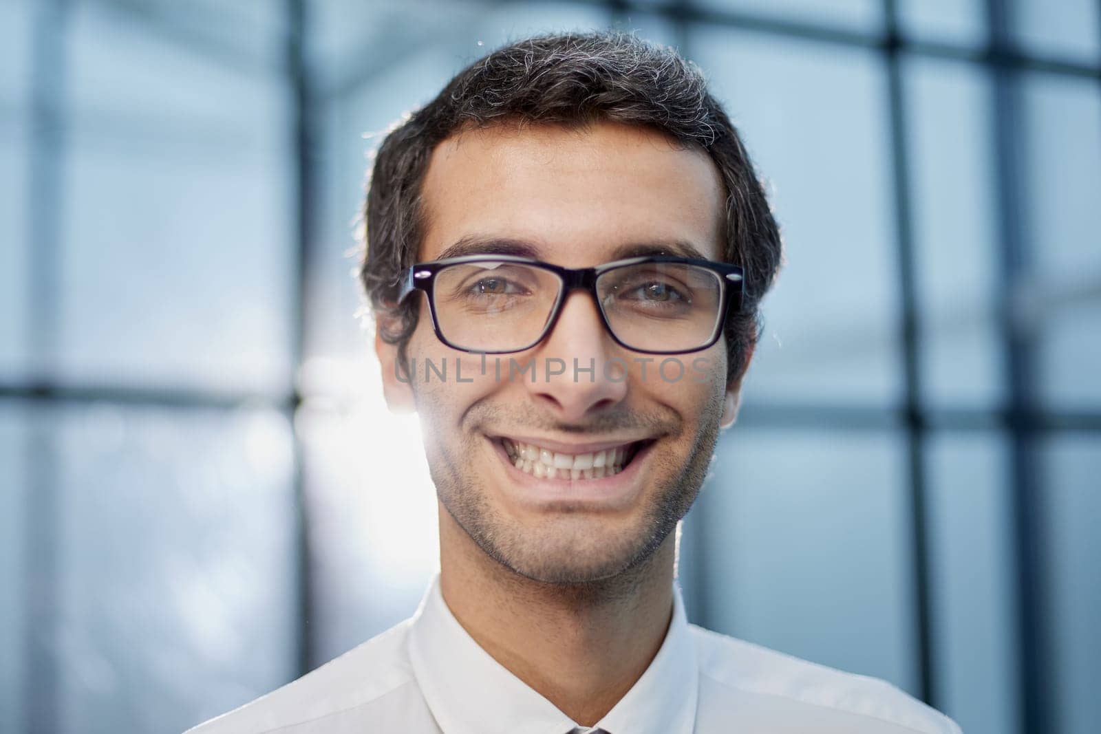 Confident caucasian businessman in a modern office