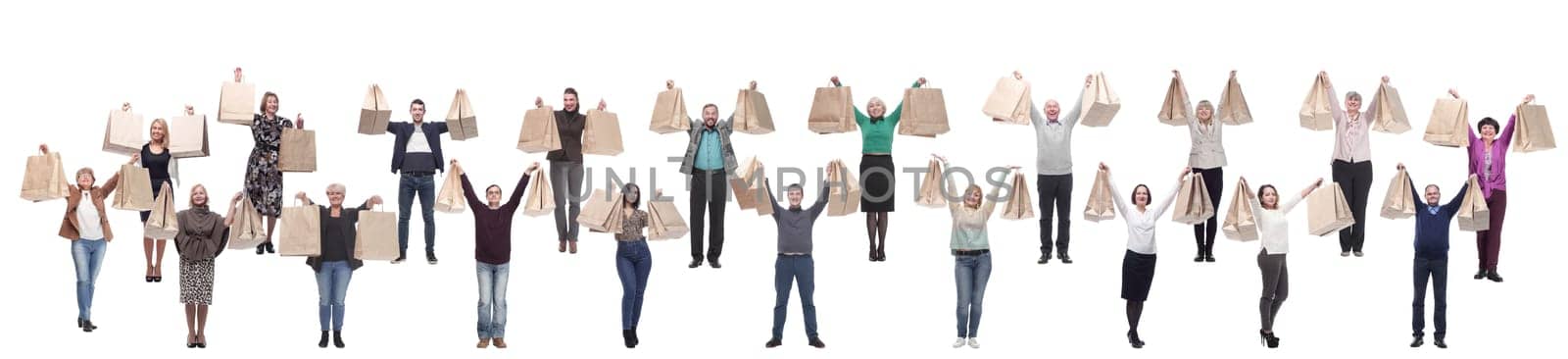 a group of people are running paper shopping bags by asdf