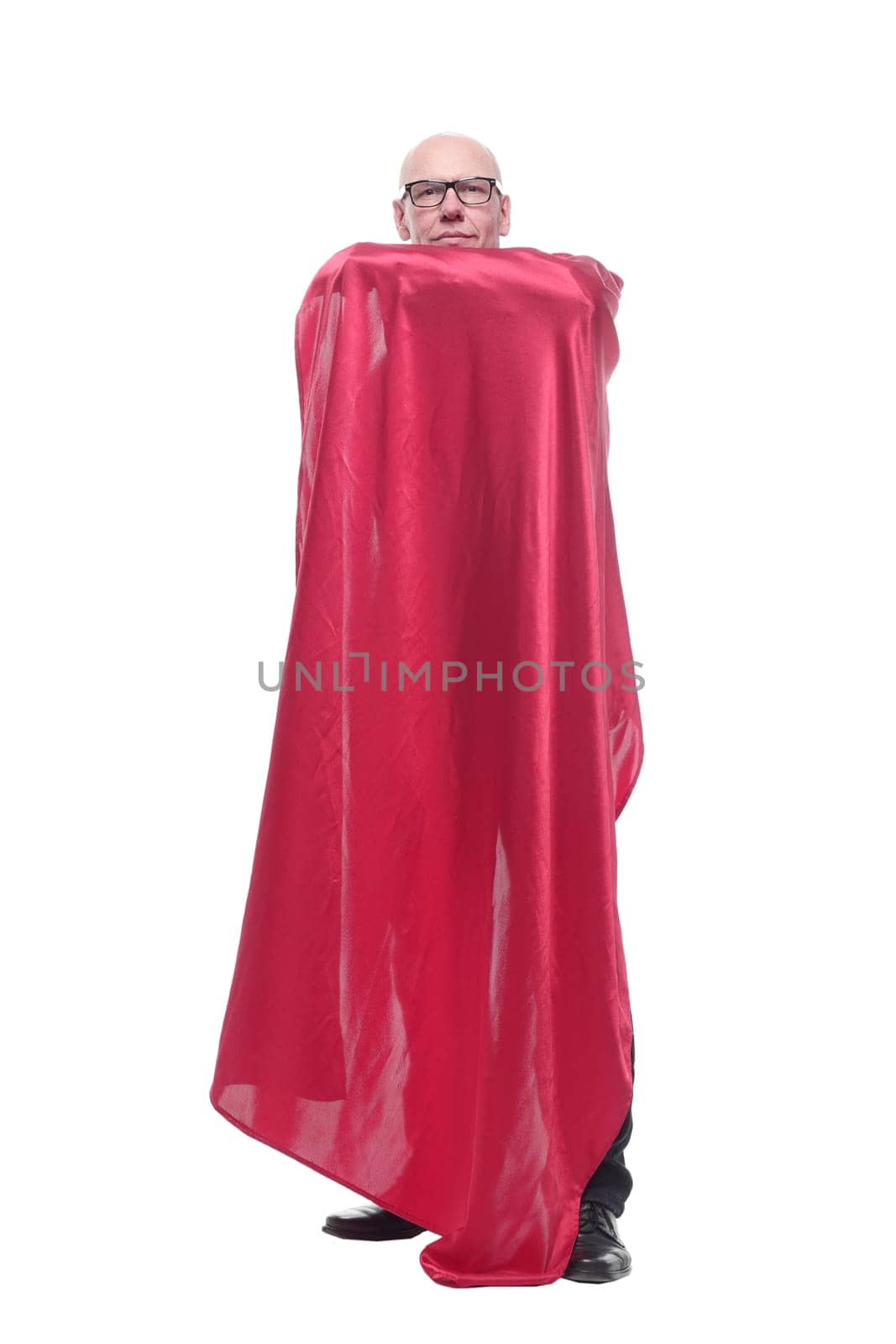 in full growth. business man in a superhero raincoat. isolated on a white background.