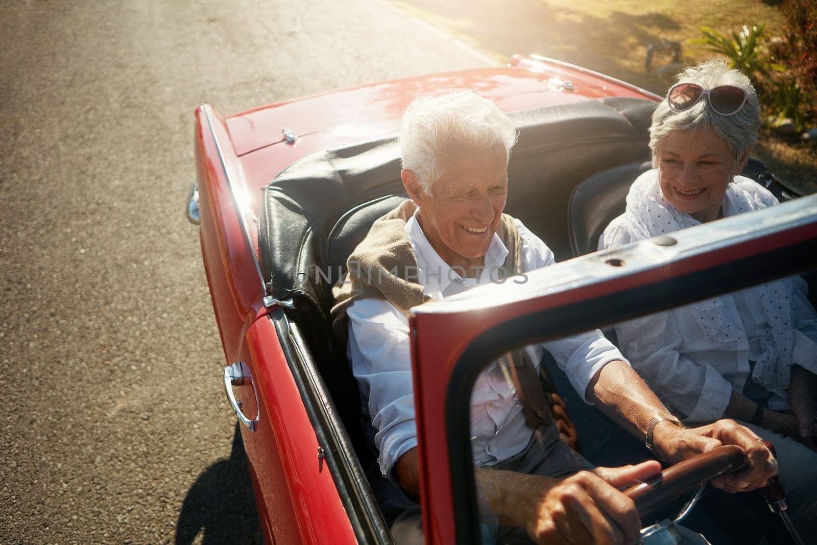 Theres plenty of time to travel during retirement. a senior couple going on a road trip. by YuriArcurs