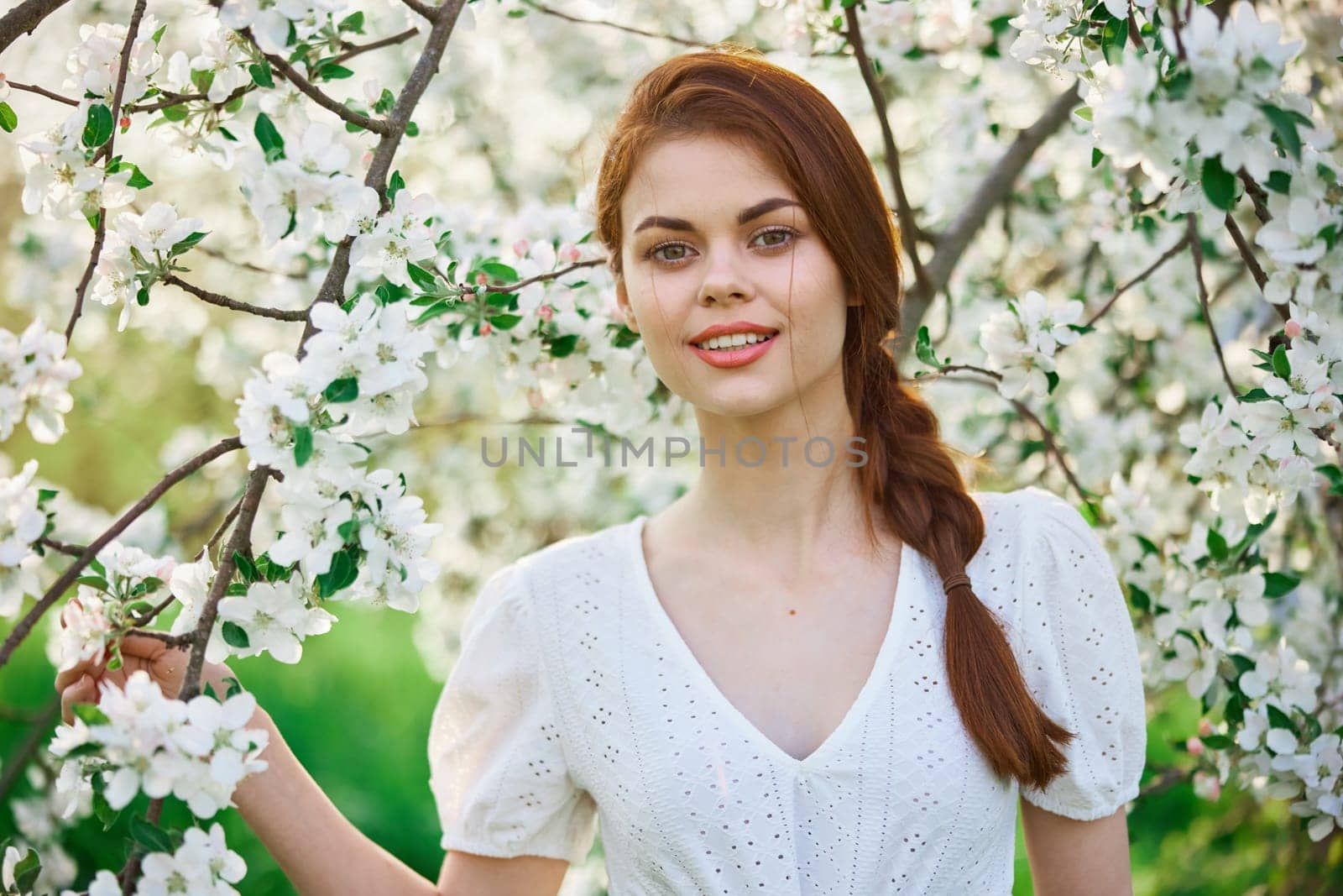 Spring woman in summer dress walking in park. High quality photo