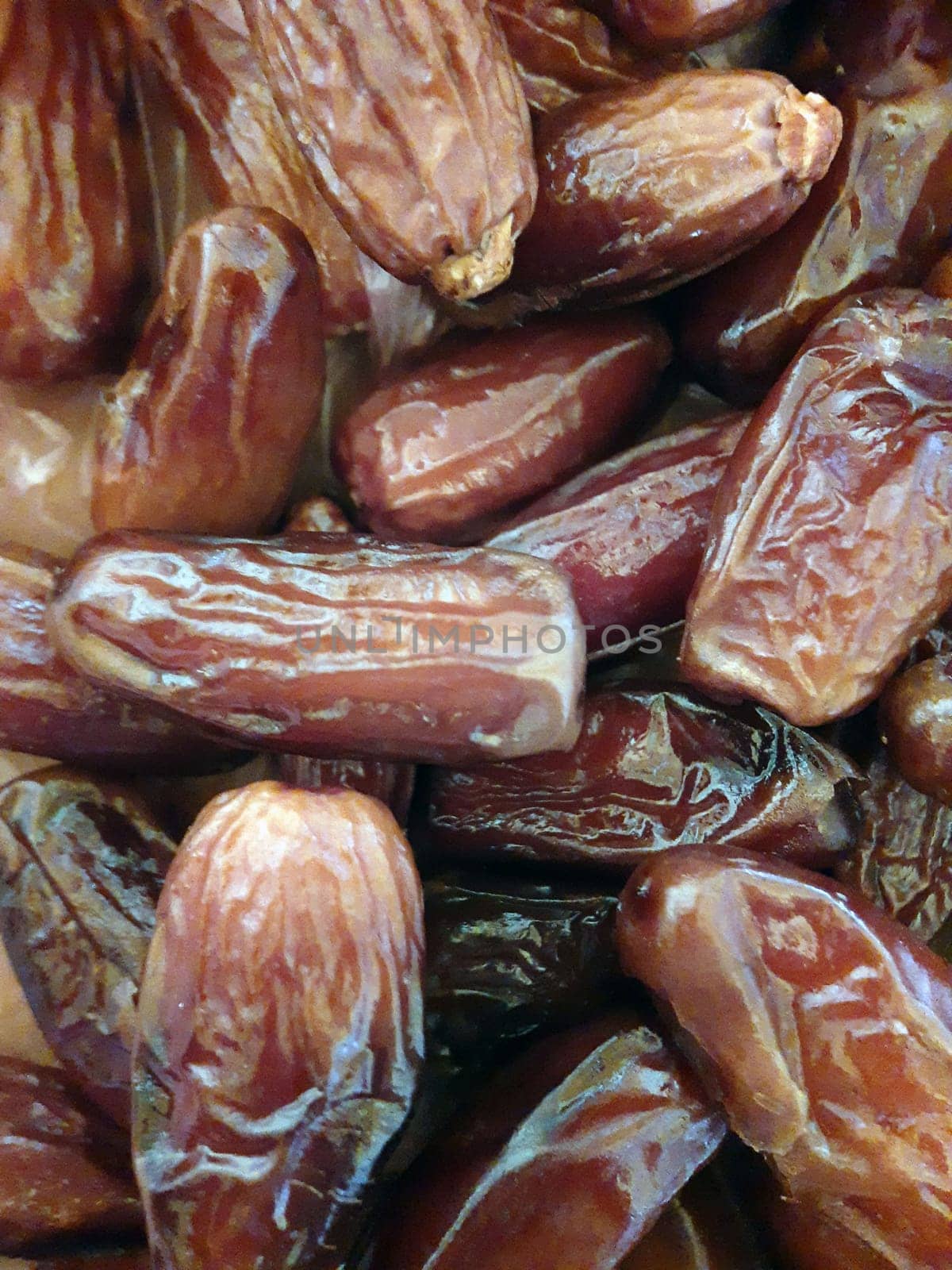 Dried dates close up by Endusik