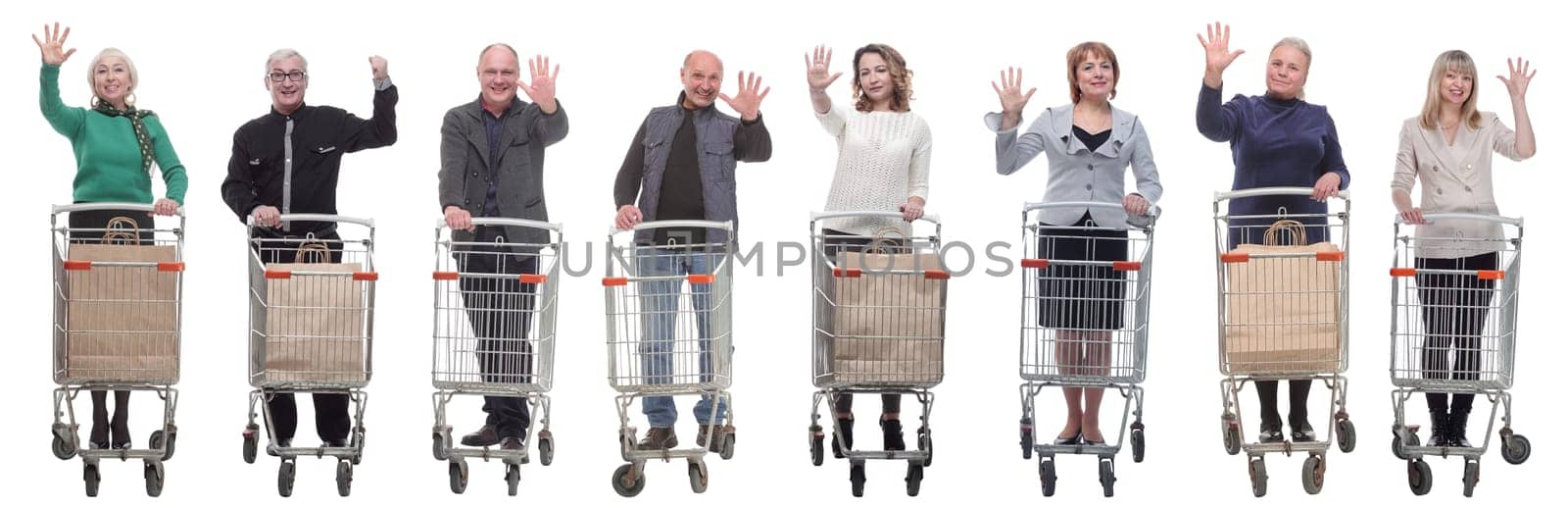 group of people with shopping cart showing thumbs up at camera by asdf