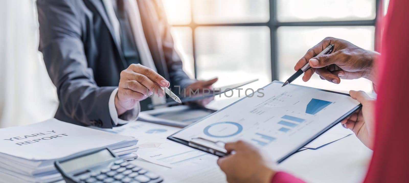 Business People Meeting using laptop computer,calculator,notebook,stock market chart paper for analysis Plans to improve quality next month. Conference Discussion Corporate Concept.